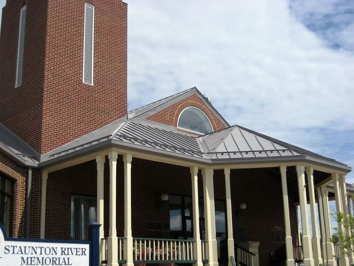 Skilled roofing craftsmen working on a residential roof in Berrysburg